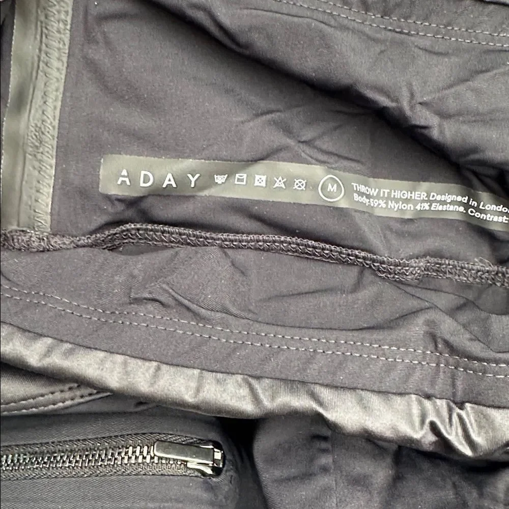 ADAY | Throw it Higher Black Zipper Leggings | M